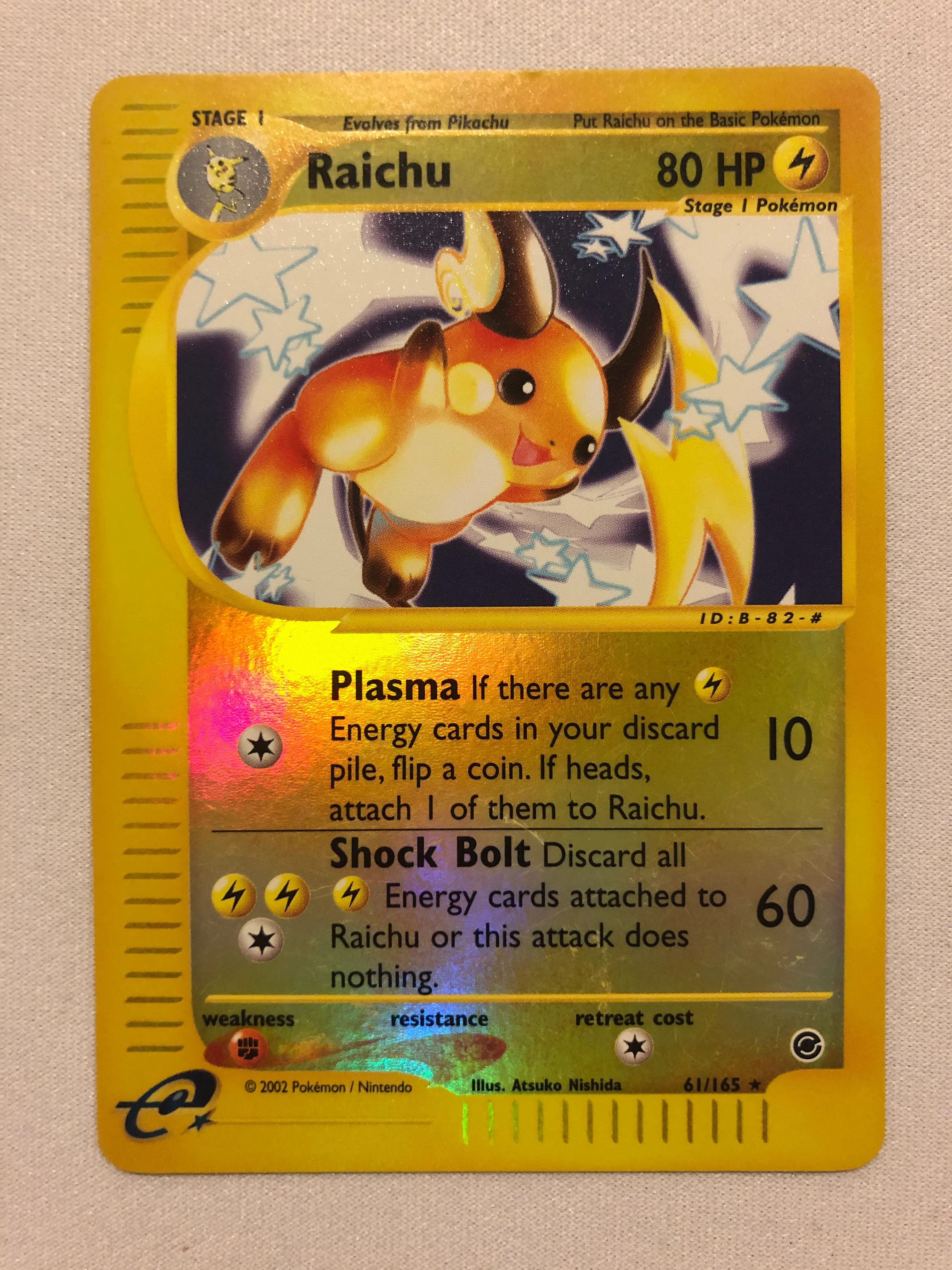 Raichu 61/165 Reverse Holo Rare Expedition Base Set Pokemon Card Near Mint